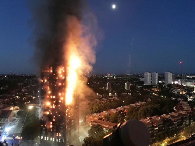 London fire singes British politics, death toll expected to rise to 80