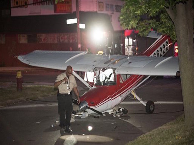 Pilot, bystander hurt after plane crashes in Detroit street