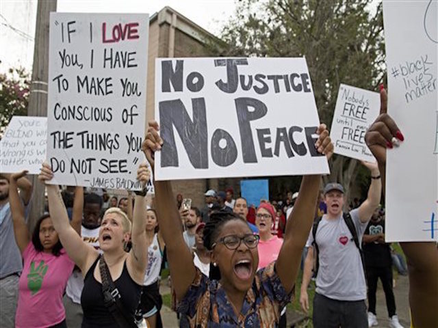 Protests over police killings aim at occupying interstates
