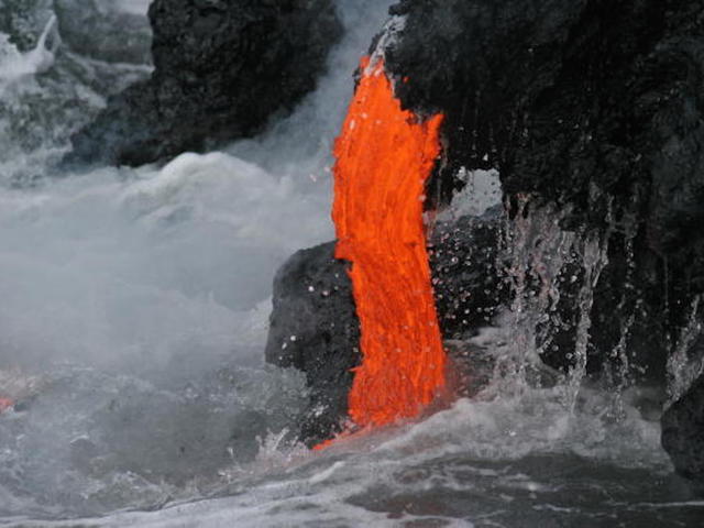 Thousands rush to see Kilauea lava flow reach ocean