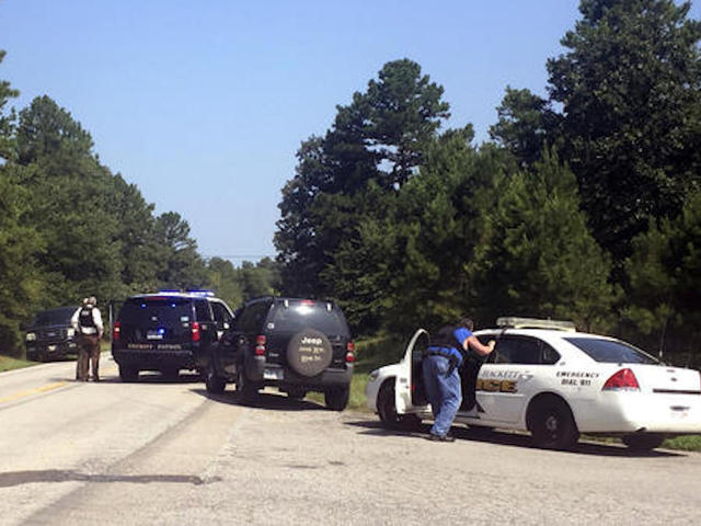 Two officers shot in rural Arkansas, one killed