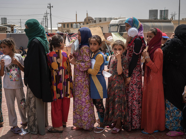 100,000 civilians displaced by Iraq battle preparations, UN says