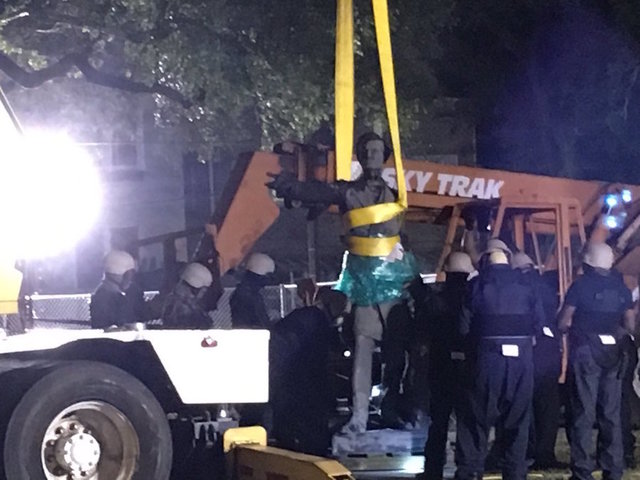 Opposing crowds assemble as New Orleans begins removing Confederate monument