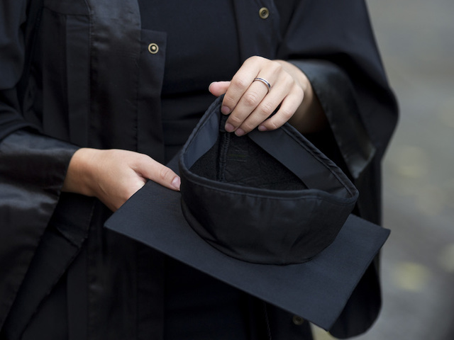 University sorry for saying women should wear low-cut tops to graduation
