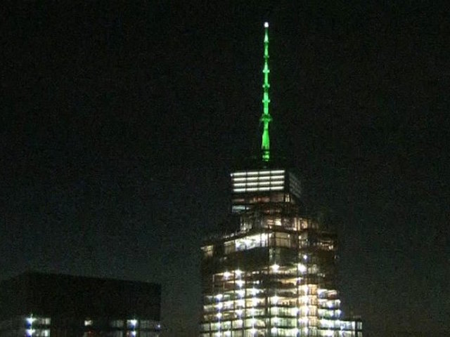 US buildings light up green in solidarity with Paris accord, in defiance of Trump