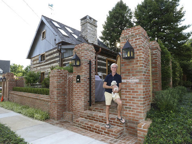 Man finds out small house is actually 300-year-old log cabin