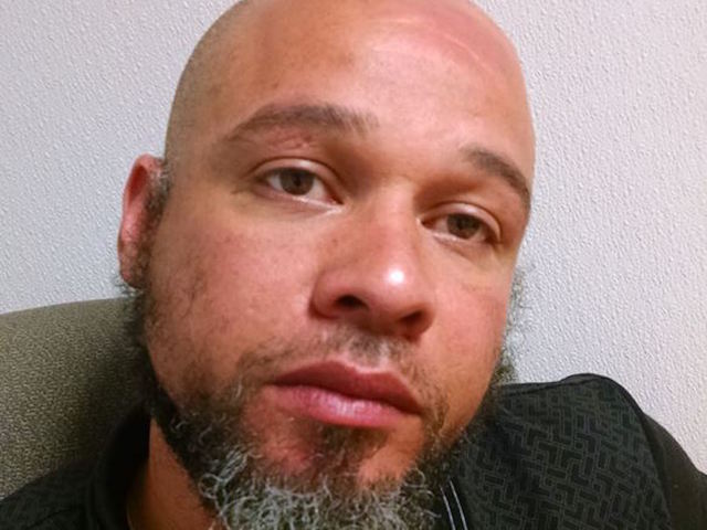 Man kills stepdad, poses with body in Twitter selfie, police say