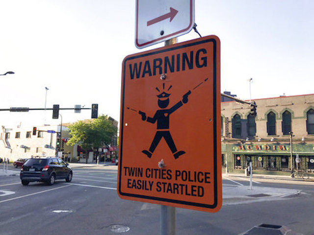 In Minneapolis, fake sign warns of 'easily startled' police