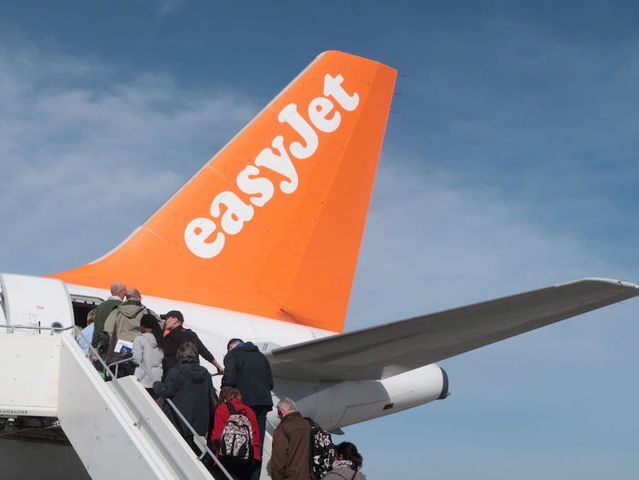 Airport worker punches Easyjet passenger holding a baby