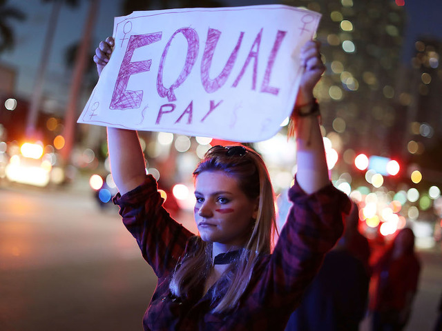 Gender pay gap widens at the top, report says