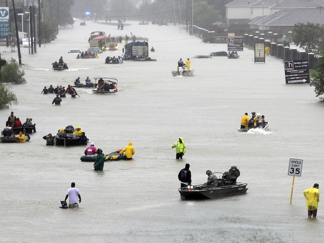 Harvey rescuers find shivering toddler clinging to body of drowned mother