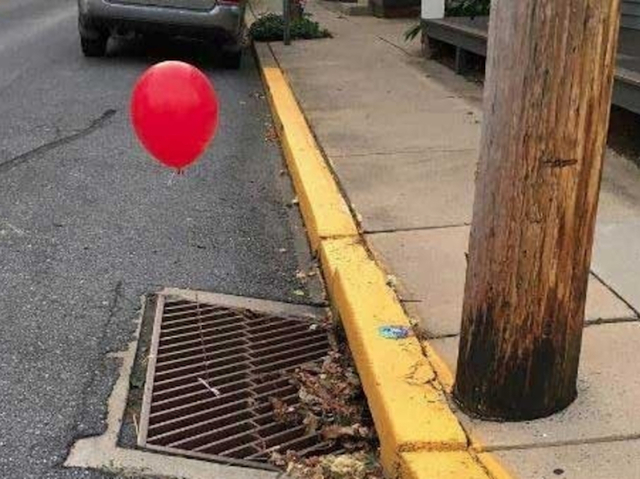 Prankster leaving 'It' movie red balloons on sewer grates