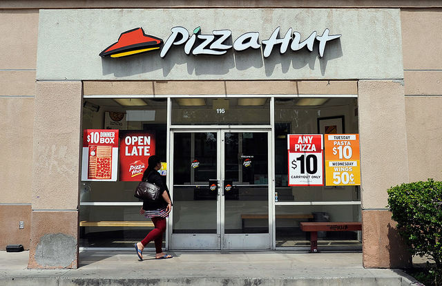 A Pizza Hut manager threatened to punish workers evacuating for Irma