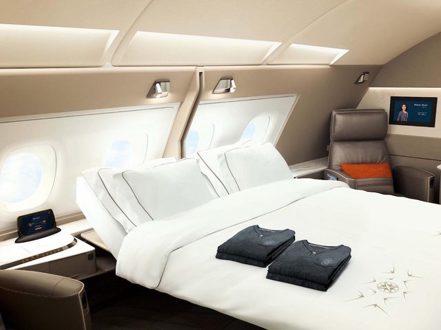 Double beds and swivel chairs are in Singapore Airlines' new luxury suites