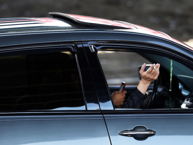 Do you text and drive? Your car insurance may go up