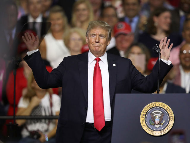 Trump warns countries against doing business with Iran as sanctions kick back in