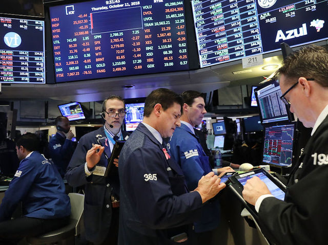 Dow slides again: Turbulence on Wall Street continues as Dow drops more than 500 points