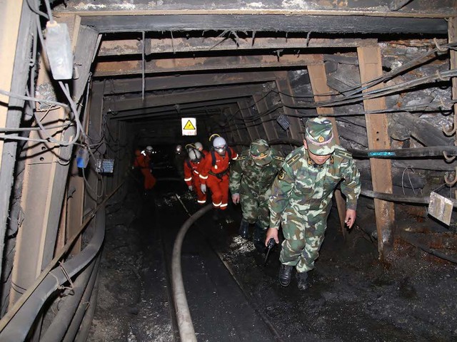 China mining accident: 18 trapped in tunnel