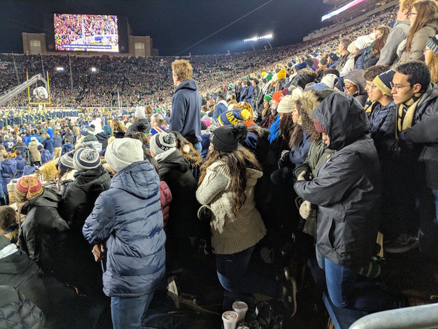 Catholic faith led 100 Notre Dame students to kneel during national anthem before football game